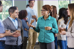 Alumni engaging at a university reunion event contributing to higher ed event ROI through post event giving and stewardship 2