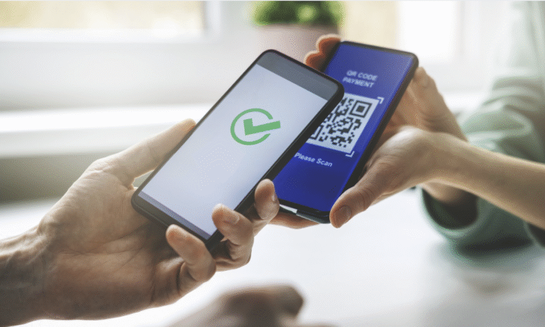 Event staff scanning attendee QR codes with a mobile device for fast, seamless event check-in in Salesforce